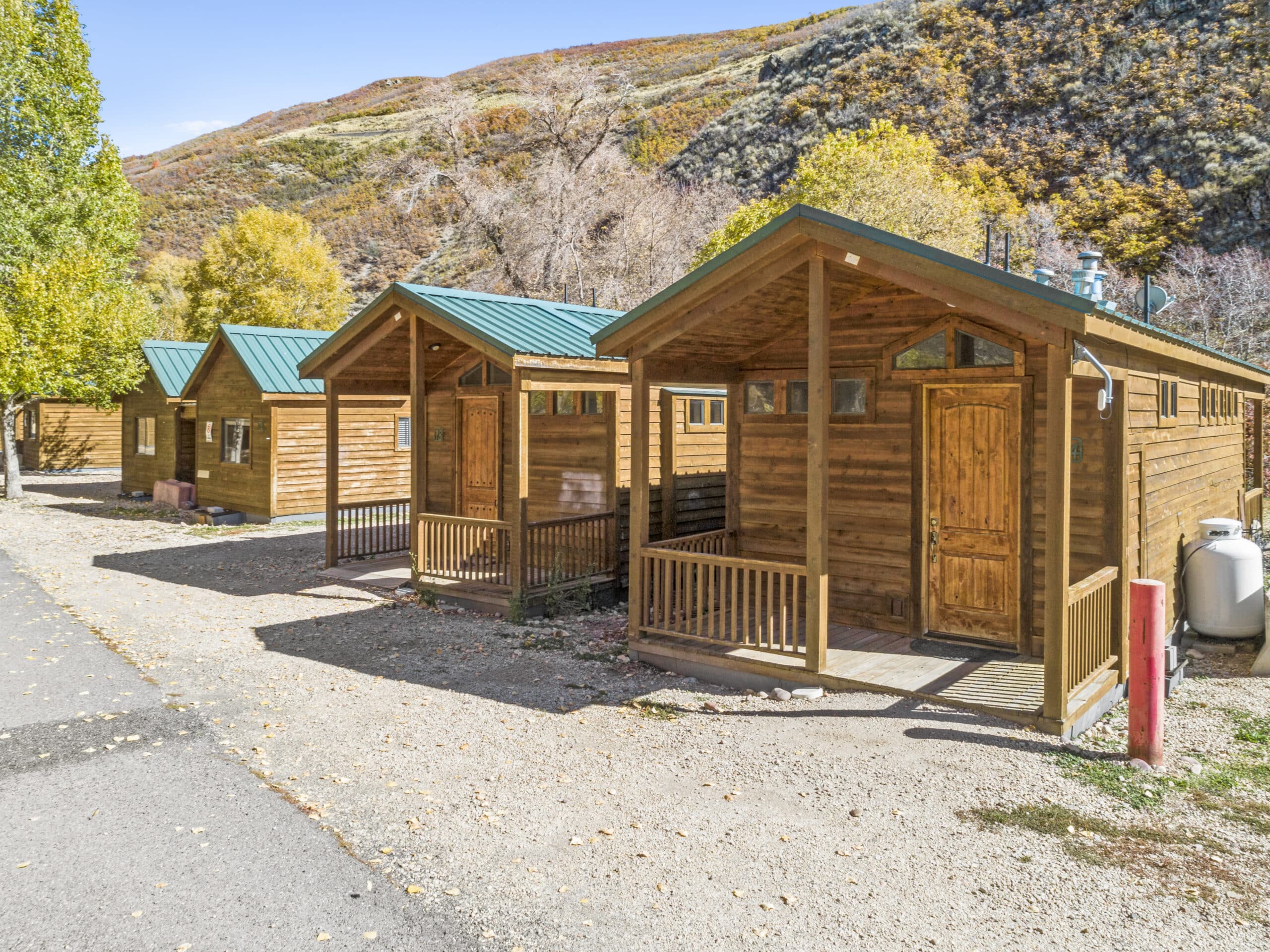 Row of cabins at the Rivers Edge campground near Heber Valley, UT